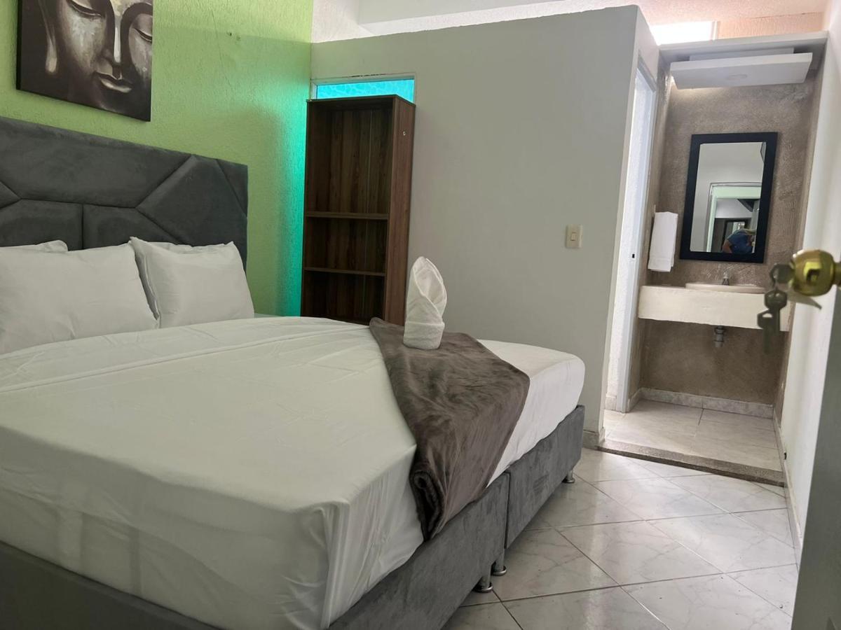 Aw Hotel Vipassa Urban Кали Екстериор снимка